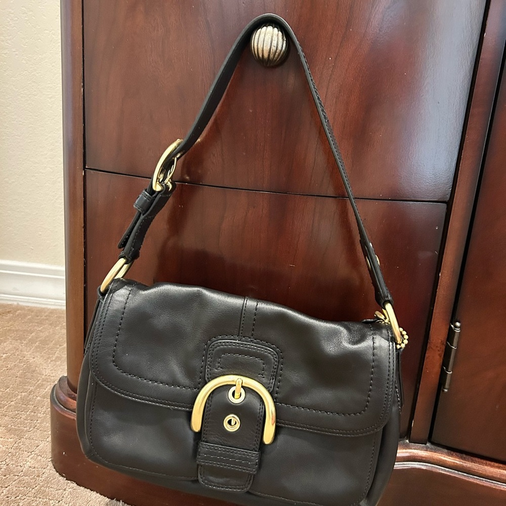 Coach black leather handbag. Great condition. From a smoke free home.